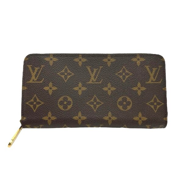 LOUIS VUITTON Brown Monogram Wallet - Picture 1 of 11
